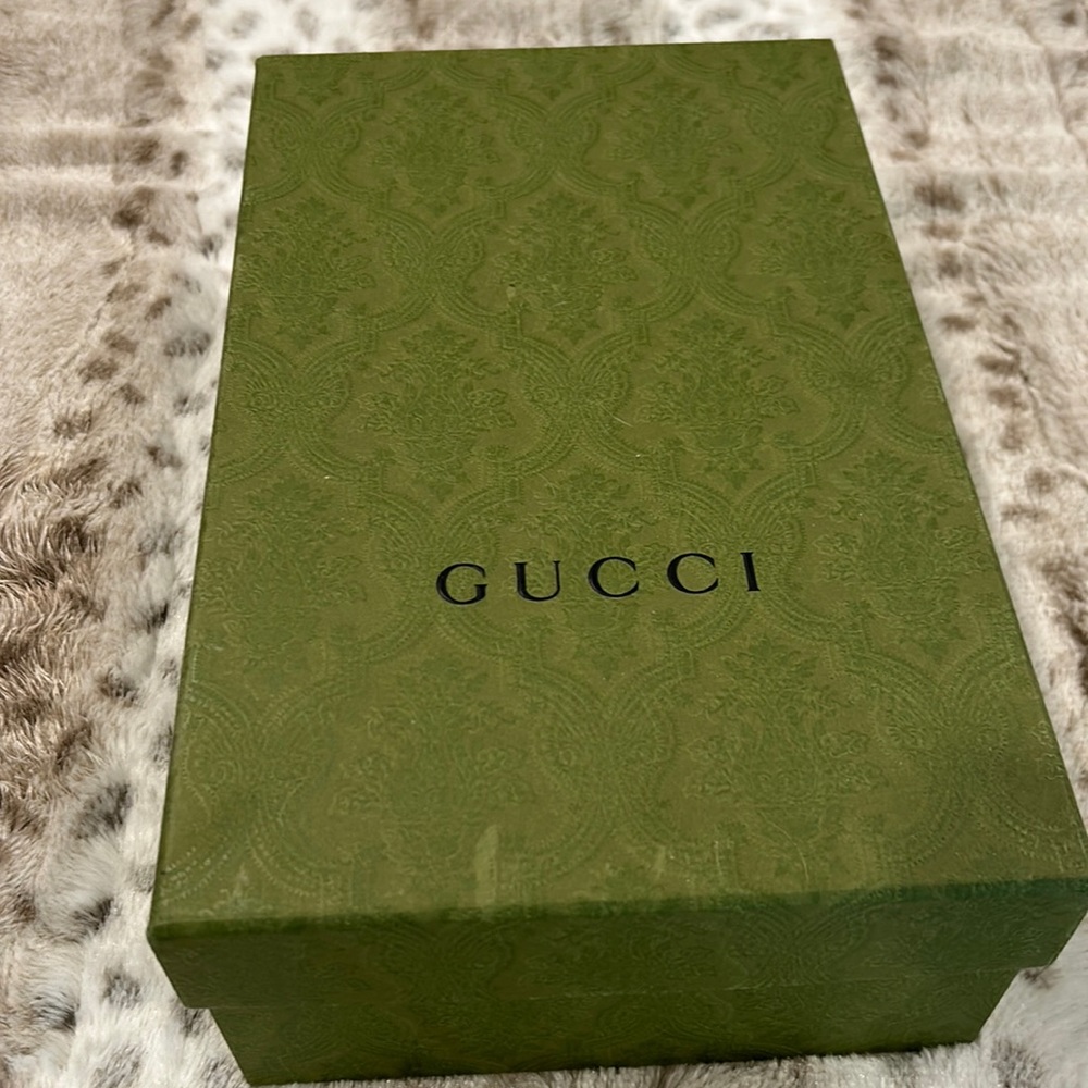 Gucci black leather with gold chain mules. Authentic